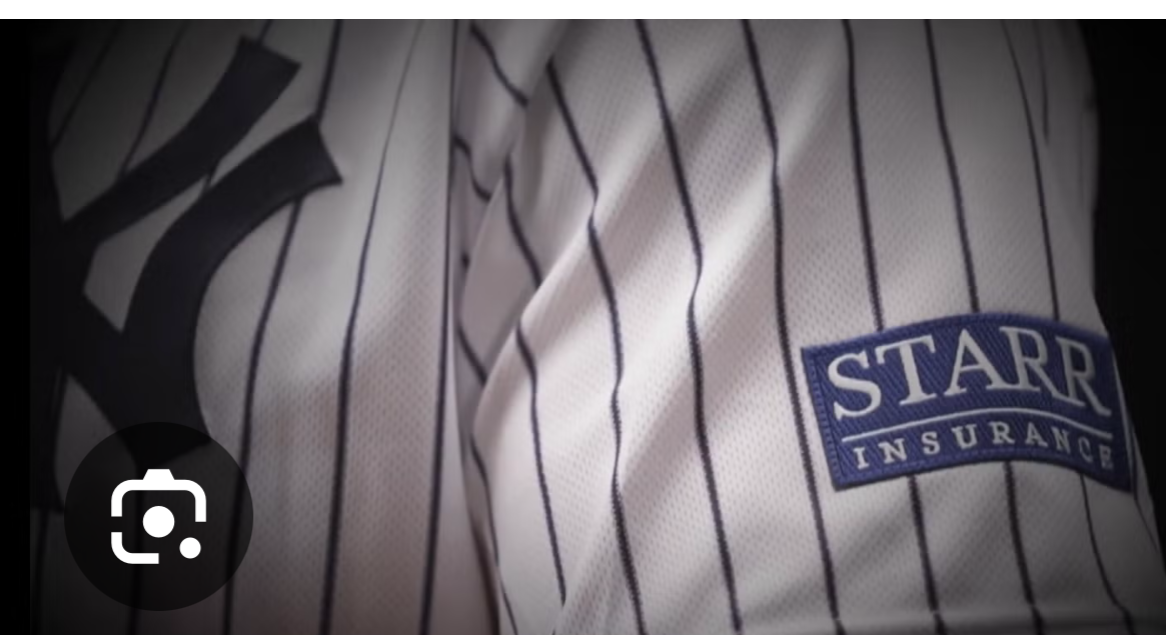 The Starr Insurance patch on a New York Yankees pinstripe jersey.